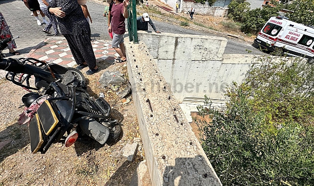 Hızını alamayan elektrikli bisikletli 2 kişi 5 metre aşağı uçtu