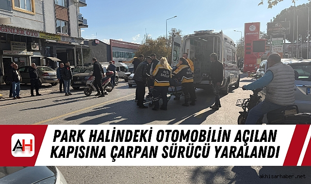 Park Halindeki otomobilin açılan kapısına çarpan sürücü yaralandı